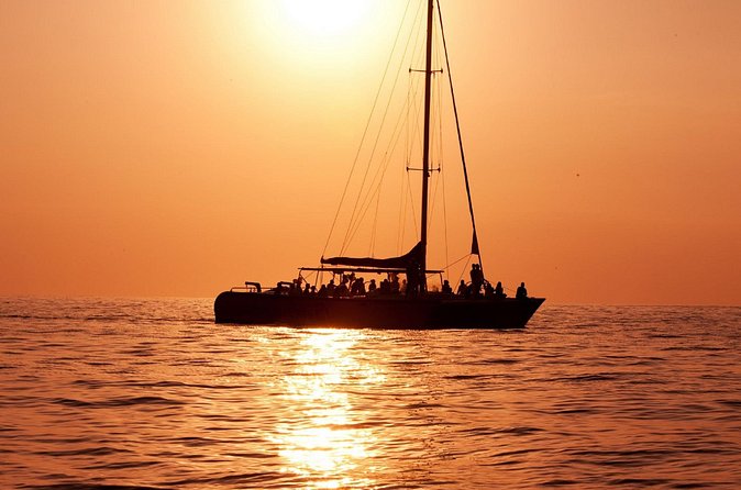Antigua Sunset Catamaran Cruise From St. John's - The Deck Atmosphere: Music, Dancing, and Crew Attention