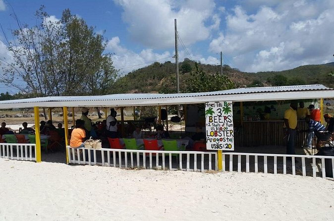 Classic Beach Break - Island culture between swims: Mamma Nancy, steel pan, and reggae