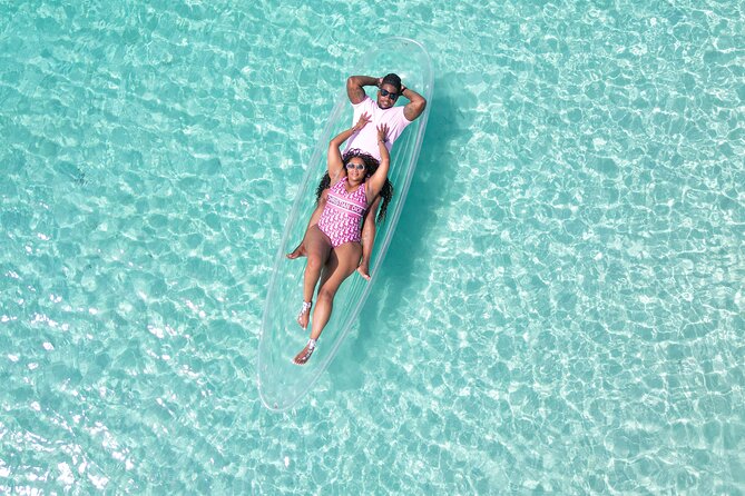 Crystal Clear Kayak Drone Photography Antigua - Entering the glass-kayak look, with drone angles you can’t recreate